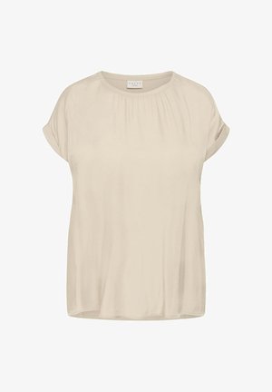 Blusa beige de manga corta con escote redondo, suaves frunces debajo del cuello y mangas con puño.