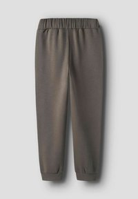 Pantalons jogger gris foncé à taille élastique, avec des poignets côtelés, présentés à plat sur un fond clair.