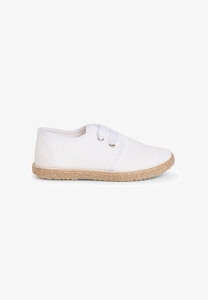 White canvas shoes with a round toe, elastic laces, and a textured woven jute sole. The upper features a smooth, matte finish.