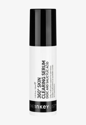 360° Hudrensande Serum i en vit flaska med matt yta, svart lock och text som specificerar aktiva ingredienser: dioic och salicylsyra.