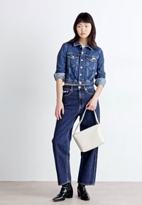 Calvin Klein EMBOSSED LOGO SMALL TOTE - Borsa a mano - gray morn