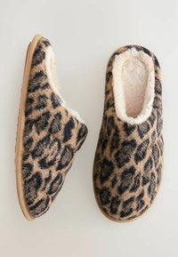 Leopard print slippers featuring a soft faux fur lining, a slip-on design, and a durable sole. The main color is tan with black spots.