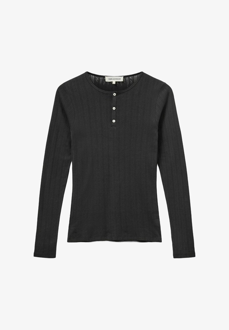 Crna majica s dugim rukavima, rebrastom teksturom, okruglim izrezom, tri dugmeta do grudi i tijelom koje se prilagođava. Mekani, rastezljivi materijal.