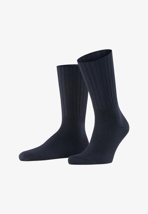 Dunkelnavyfarbene Socken mit einem gerippten Muster, mittellange Länge bis zur Wade und verstärkten Zehen- und Fersenbereichen für Langlebigkeit. Glatte Oberfläche, elastischer Stoff.