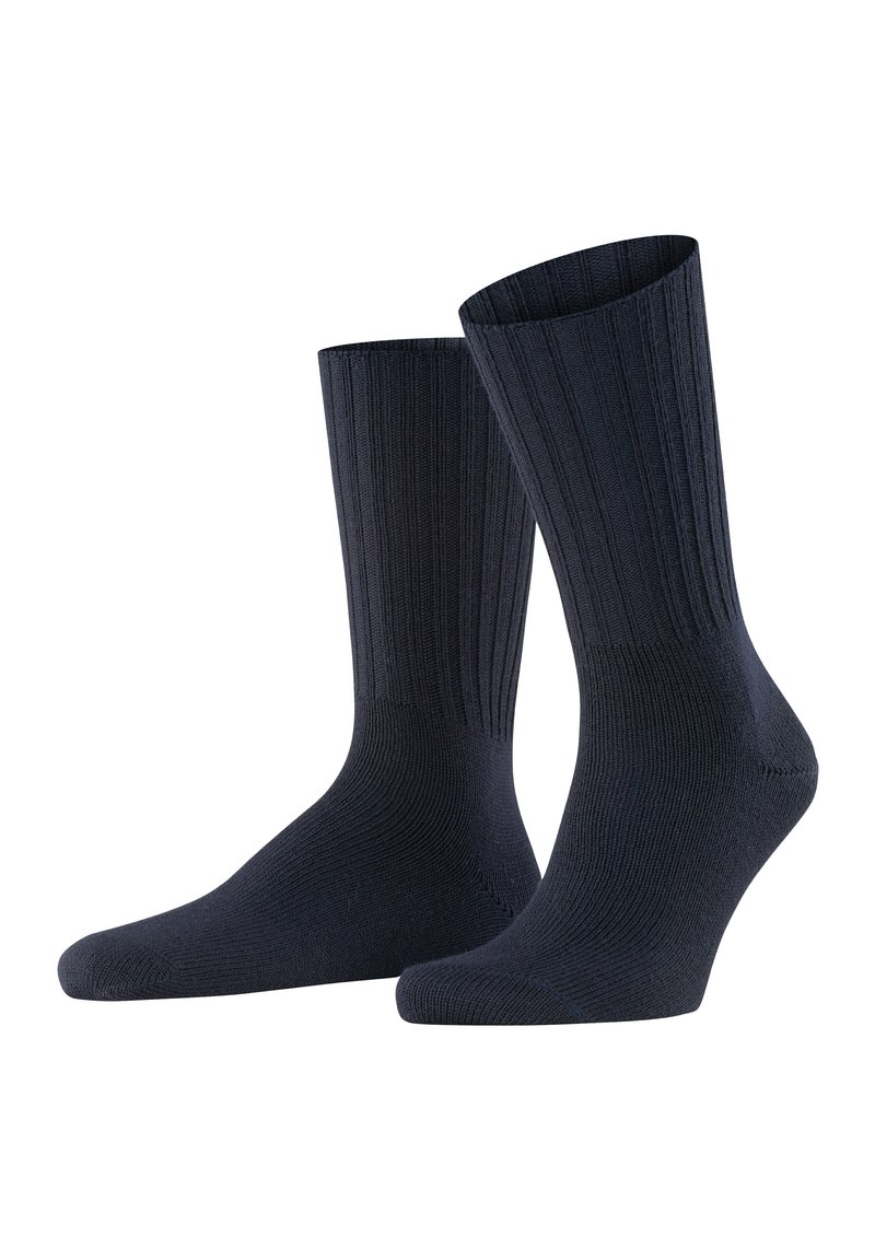 Calcetines de un azul marino oscuro con una textura acanalada, de longitud media hasta la pantorrilla, y áreas de puntera y talón reforzadas para mayor durabilidad. Acabado suave, tejido elástico.