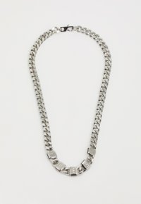 Silver chain necklace featuring large links and alternating engraved block letters spelling "GUESS" on metallic accents.