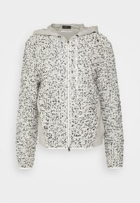 Texturerad hoodie med ett svartvitt prickigt mönster, med en grå huva och framdragkedja. Innehåller dragsnören och sidofickor.