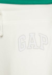 GAP HERITAGE JOGGER - Donji dijelovi trenirke - new off white