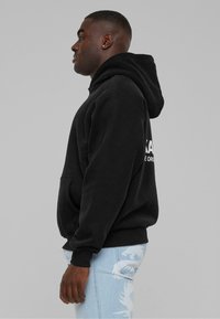 Sweats & sweats à capuche Karl Kani pour femme en ligne