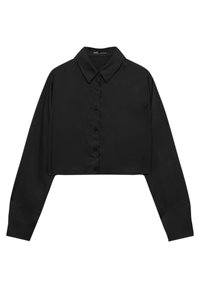 Blouse noire courte en tissu lisse, avec un devant boutonné, des manches longues et un col classique.