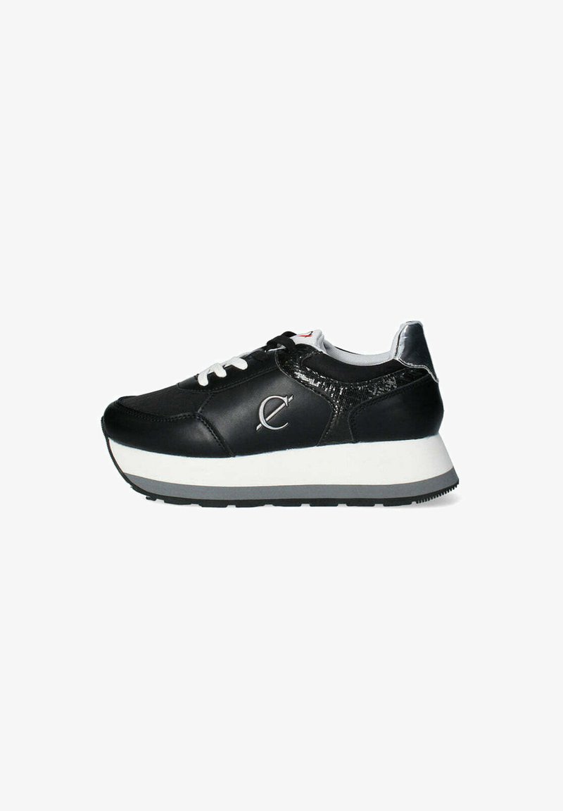 Black leather sneaker with white laces, metallic accents, and a thick white sole. Features a textured overlay and logo detail on the side.