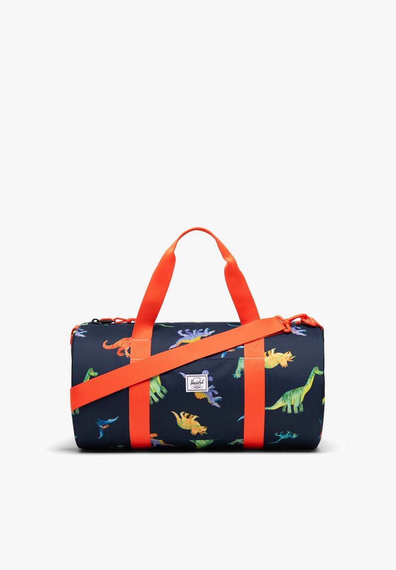 Sac polochon bleu marine avec des sangles orange vif et des motifs colorés de dinosaures sur toute sa surface, avec un écusson logo à l’avant.