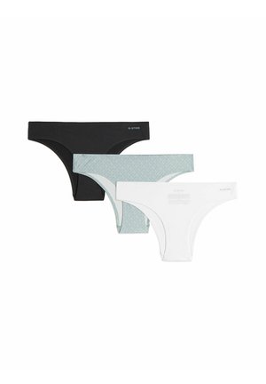 Tre perizoma senza cuciture da donna in nero, azzurro chiaro fantasia e bianco, disposti sovrapposti su sfondo bianco.