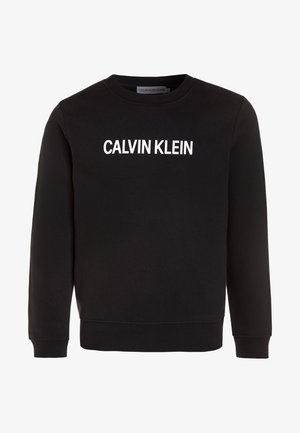 Sort bomulds-sweatshirt med rund halsudskæring, med "CALVIN KLEIN" trykt i store hvide bogstaver på tværs af brystet. Ribstrikkede ærmegab og kant.