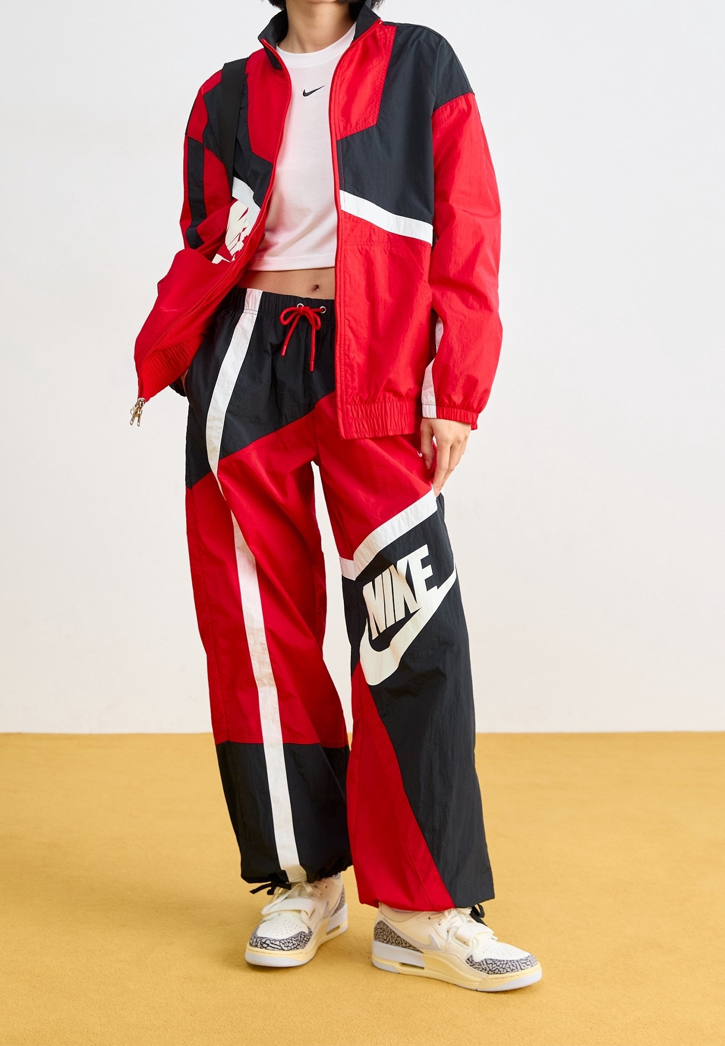 red nike windbreaker pants