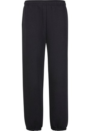 Pantaloni della tuta neri realizzati in tessuto morbido, con vita elastica, gambe affusolate e polsini elastici alla caviglia. Presentano tasche laterali.