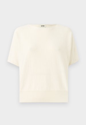Krémové tričko s krátkým rukávem, volného střihu, ribbeným lemem a kulatým výstřihem; vyrobené z měkké, lehké tkaniny.