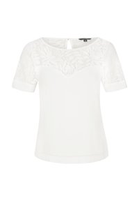 Haut à manches courtes blanc avec un design floral en dentelle au niveau des épaules et un dos en forme de clef. Texture lisse avec une coupe légèrement ajustée.