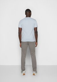 Calvin Klein FRONT LOGO - T-shirt estampada - bayshore blue