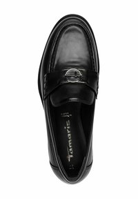 Black leather loafer with a rounded toe, featuring a silver circular accent and embossed brand logo on insole. Smooth texture, classic design.