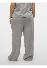 Grijze, gestructureerde wijd-uitlopende broek met een losse pasvorm en elastische tailleband, met subtiele kleurvariaties voor extra diepte.
