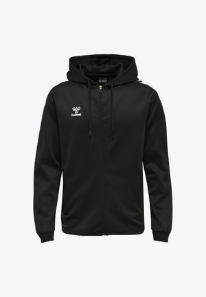 Schwarzer Kapuzenpullover mit Reißverschluss und Kordelzug, weißes hummel-Logo auf der Brust und Chevron-Streifen auf den Schultern. Lange Ärmel mit gerippten Bündchen.