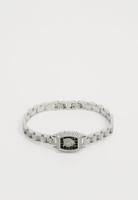 Sølvmetallarmbånd med et dekorativt rektangulært lås med svart midtpunkt, omgitt av klare rhinestones og teksturerte lenker.