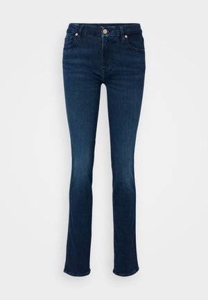 Tmavomodré džíny z denimu, s vysokým pásom a slim fit strihom, s predným zapínaním na gombík a jemnými švami na vreckách.