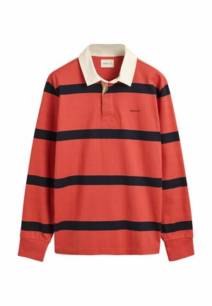 Polo de manga larga en color coral con rayas navy, con un color blanco en el cuello, tapeta de dos botones y un pequeño logo en el pecho.