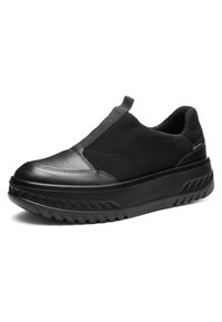 Black slip-on sneaker with thick textured sole, leather toe cap, elastic front panel, and Gore-Tex label on heel area.