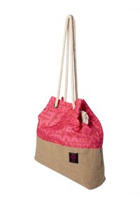 Strand-Umhängetasche mit rosa gemustertem Obermaterial, beigem geflochtenem Boden, Seilgriffen und schwarzem Etikett mit pinkem Logo.