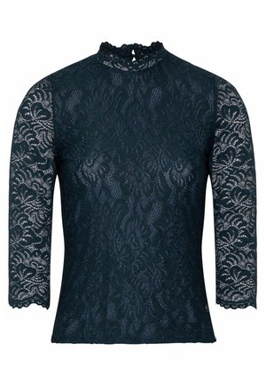 Top en dentelle bleu canard foncé avec un col haut, des manches longues transparentes et des bords festonnés. Motif floral complexe avec une silhouette ajustée.