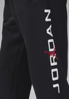 JORDAN ESSENTIALS - Pantaloni de trening - black