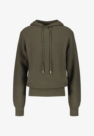 Haut à capuche vert olive avec un motif texturé, une capuche à cordon de serrage et un ourlet côtelé. Éléments de quincaillerie dorée. Design décontracté et crop.