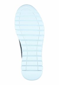 Suola di una scarpa realizzata in materiale gommoso bianco con scanalature testurizzate per una migliore aderenza. Il tacco è arrotondato e il design presenta diverse striature.