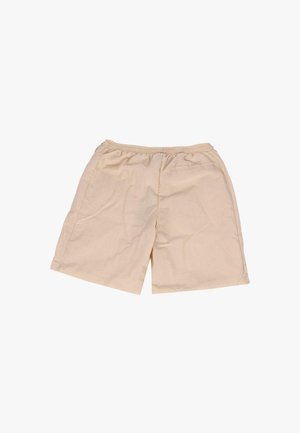 Pantaloni corti beige realizzati in tessuto leggero con cintura elastica, caratterizzati da una texture a griglia e una singola tasca sul retro.