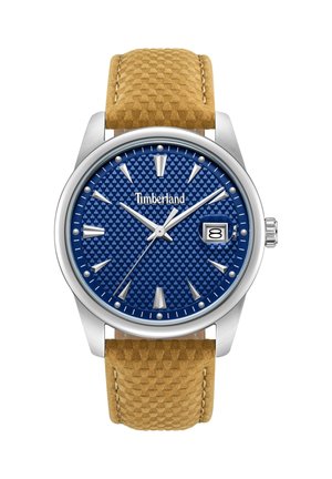 Analógové hodinky Timberland s textúrovaným modrým ciferníkom, striebornými indexmi, dátumom na pozícii 3 hodín a koženým remienkom s béžovým vzorom.