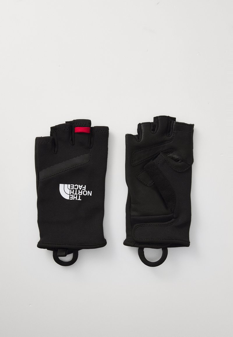 Černé rukavice bez prstů vyrobené z texturovaného materiálu. Obsahují logo The North Face, červený akcent a smyčky pro snadné sundání.