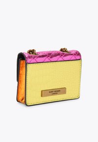 Gold and pink faux-crocodile handbag with a yellow body, featuring a gold metal logo plate and chain strap. Smooth and reflective textures.