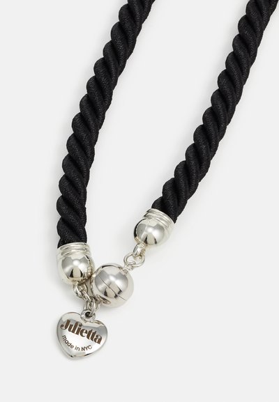 Black twisted rope necklace featuring silver hardware, two spherical accents, and a heart-shaped tag engraved with "Julietta made in NYC."
