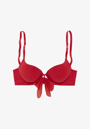 Reggiseno imbottito rosso con forma sagomata, tessuto textured caratterizzato da un motivo sottile e un dettaglio a fiocchetto centrale. Spalline in satin regolabili.