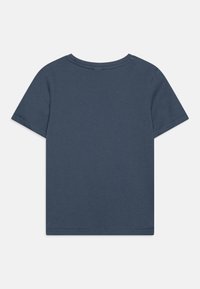 Korte mouwen T-shirt in een effen marineblauwe kleur, gemaakt van zachte katoen, met een ronde halslijn en een rechte zoom met minimale details.