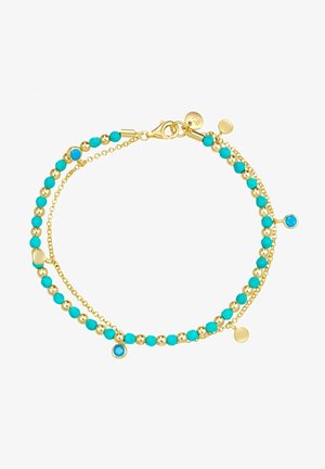 Bracelet chaîne en or avec des perles lisses en or alternées avec des perles turquoises, avec de petits charms turquoises et une fermeture à mousqueton.