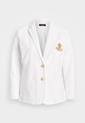 Hvit blazer med et gullmerke på lommen og gullknapper. Strukturert design med to frontlommer og figursydde ermer.