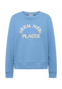 Sweat-shirt bleu clair à col ras du cou avec poignets et ourlet côtelés, arborant le texte beige "SEEK NEW PLACES" et les mots blancs plus petits "COLLECTING STORIES" sur le devant.