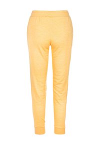 Pantaloni da jogging gialli con elastico in vita, polsini aderenti e una consistenza morbida. Visuale posteriore, senza motivi o accessori visibili.