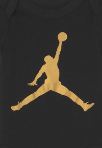 Jordan JUMPMAN BOOTIE UNISEX SET - Body - black/gold