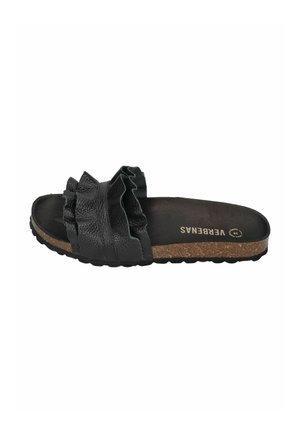 Black slide sandal with ruffled leather strap, cork sole, and textured tread, labeled "VERBENAS" inside.
