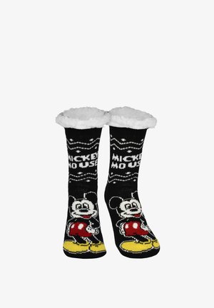 Calzini neri pelosi con polsini bianchi, raffigurante Topolino con pantaloncini rossi e scarpe gialle, con il testo "Topolino" sopra il personaggio.