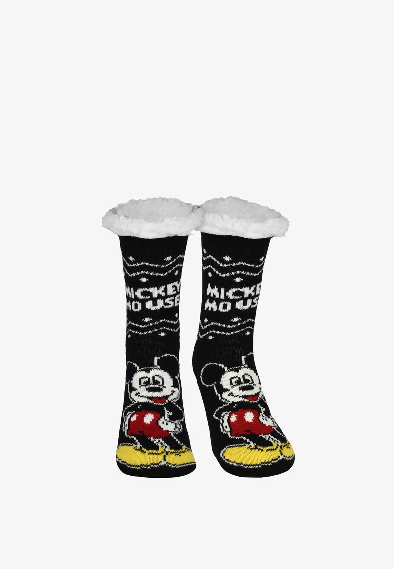Black fuzzy socks with white cuffs featuring Mickey Mouse in red shorts and yellow shoes, with "Mickey Mouse" text above the character.